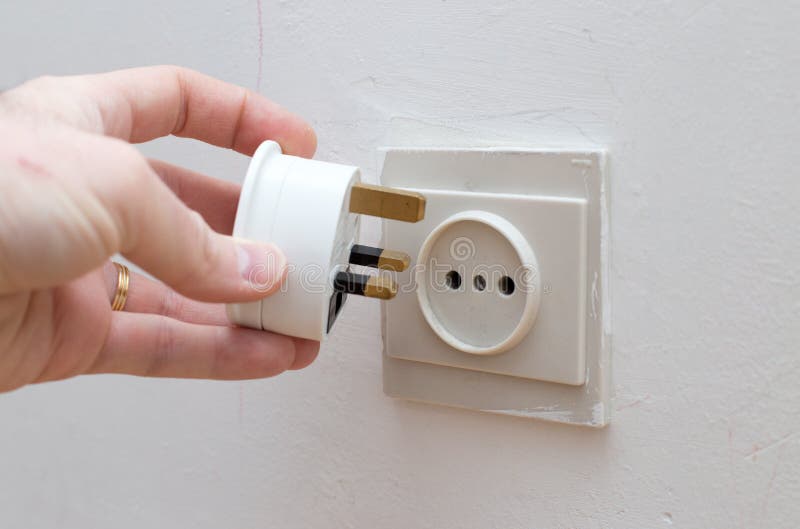 Incompatible electricity plug and socket: British and European. Incompatible electricity plug and socket: British and European