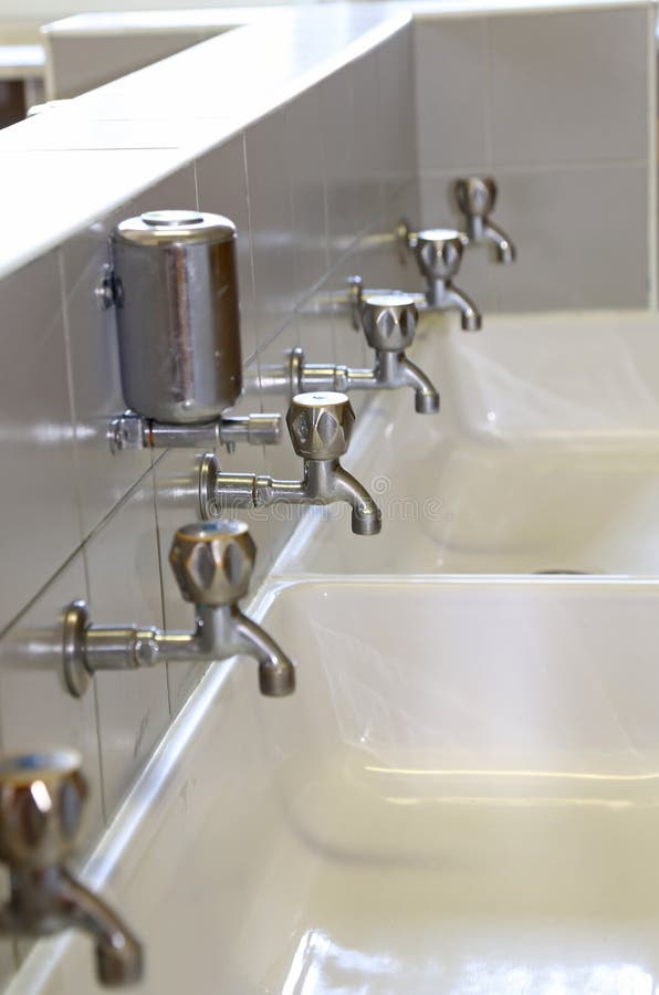 Taps at the Sink in the Bathroom of School Stock Image Image of