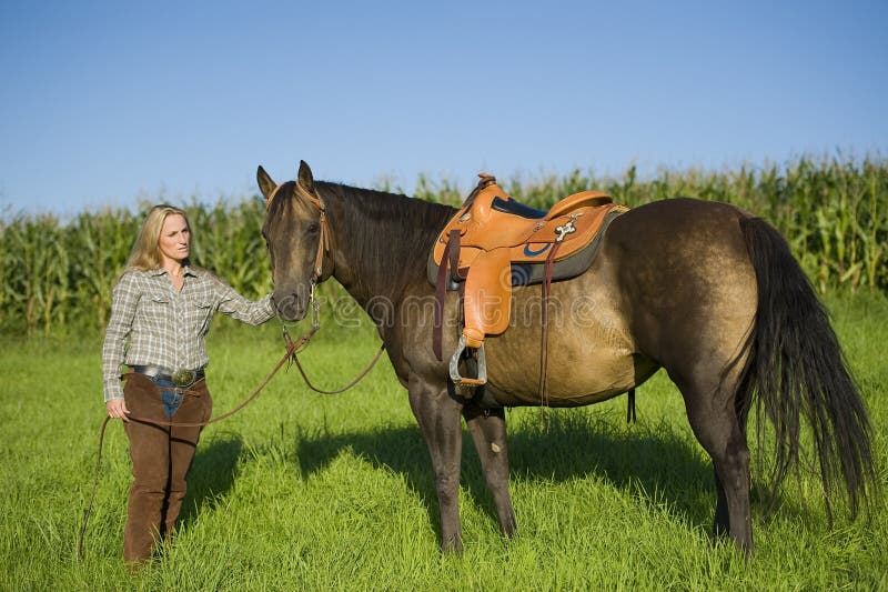 A woman with her horse. A woman with her horse