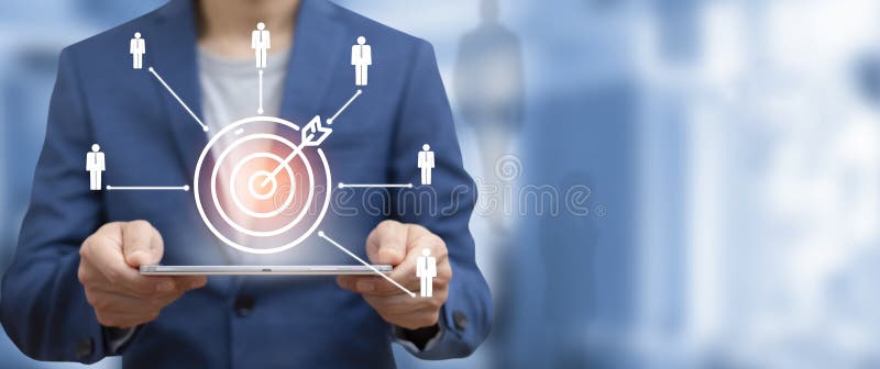 Targeting the HR business concept, Businessman holding tablet and arrow dart to virtual target dart board,Executive marketing, investment goal and target for business investment concept
