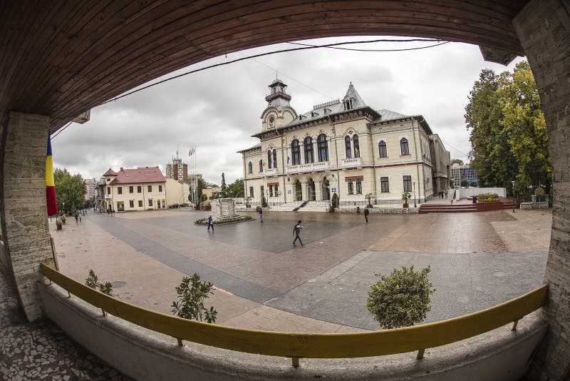 TARGU-JIU, ROMANIA-OCTOBER 08: Gorj Prefecture and the monument of Ecaterina Teodoroiu on October 08, 2014 in Targu-Jiu.