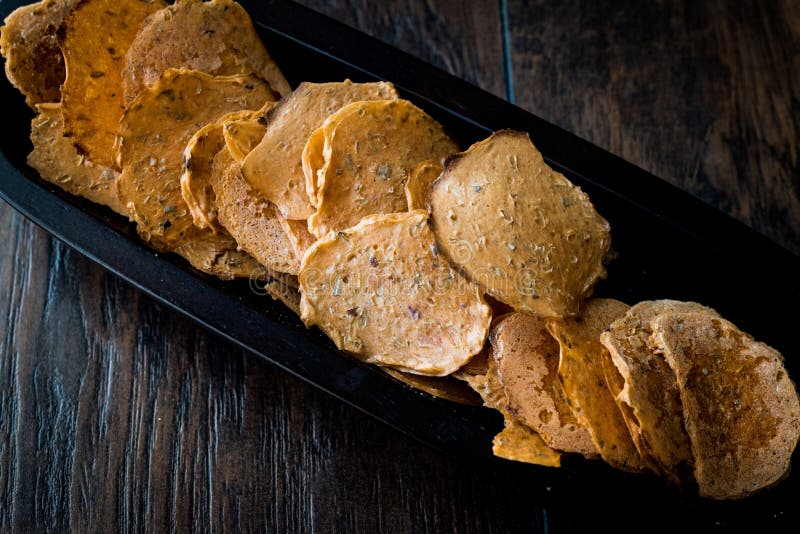 Tarhana Cipsi / Chips or Crackers in a Wooden Bowl. Stock Photo Image