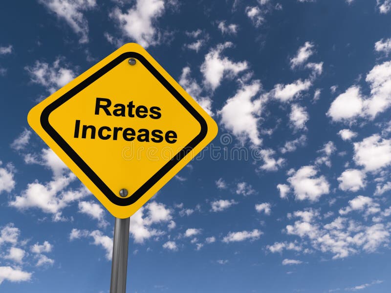 rates increase traffic sign on blue sky. rates increase traffic sign on blue sky