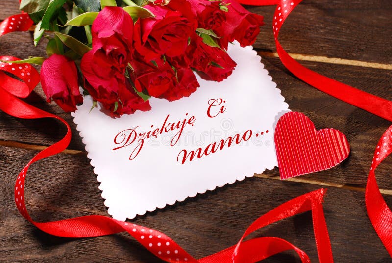 Greeting card for mother`s day with bunch of red roses and text thank you mom written in polish on white paper board. Greeting card for mother`s day with bunch of red roses and text thank you mom written in polish on white paper board