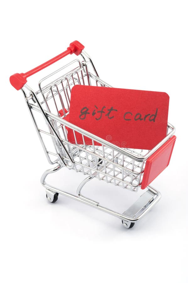 Gift card words written on red paper card in shopping cart on white background. Gift card words written on red paper card in shopping cart on white background