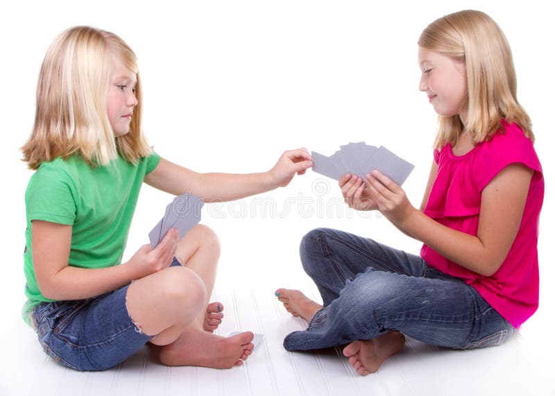 Tarjetas que juegan de las hermanas o de los amigos imagenes de archivo Tarjetas que juegan de las hermanas o de los amigos imagenes de archivo
