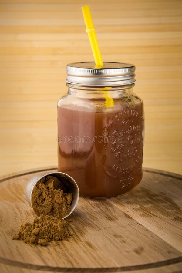 tarro del jugo y polvo del guarana de las estupendo-comidas imagen de archivo libre de regalías tarro del jugo y polvo del guarana de las estupendo-comidas imagen de archivo libre de regalías