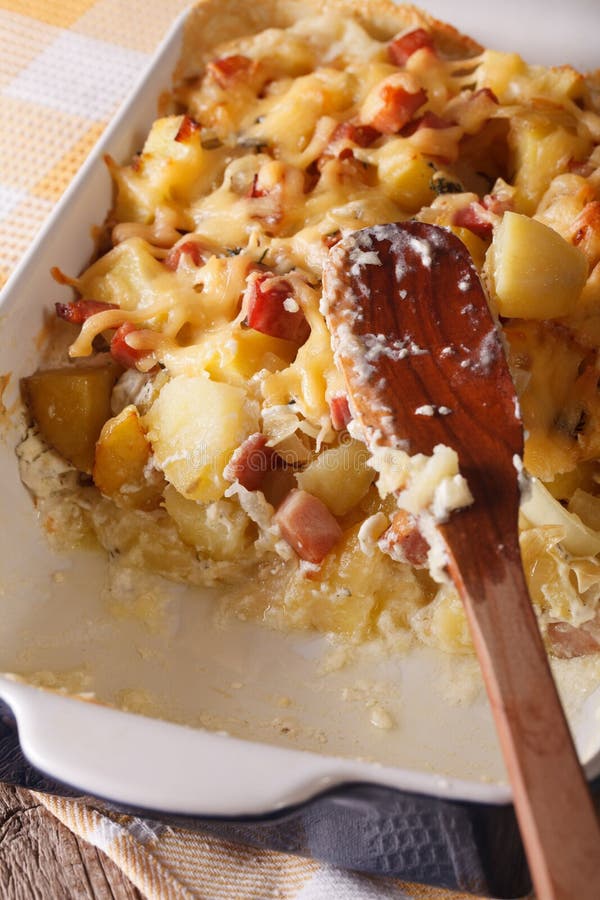 Tartiflette Potatoes with Bacon and Cheese Close Up Vertical Stock ...