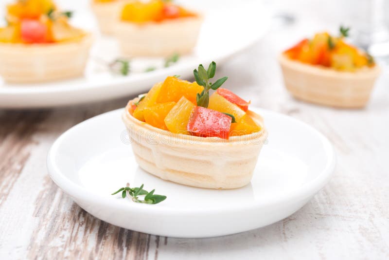 Tartlet with roasted vegetables on a plate