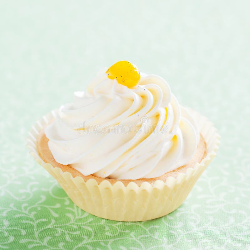 Tartlet with whipped cream, vanilla and jam, selective focus. Single mini stock images, royalty-free photos and pictures