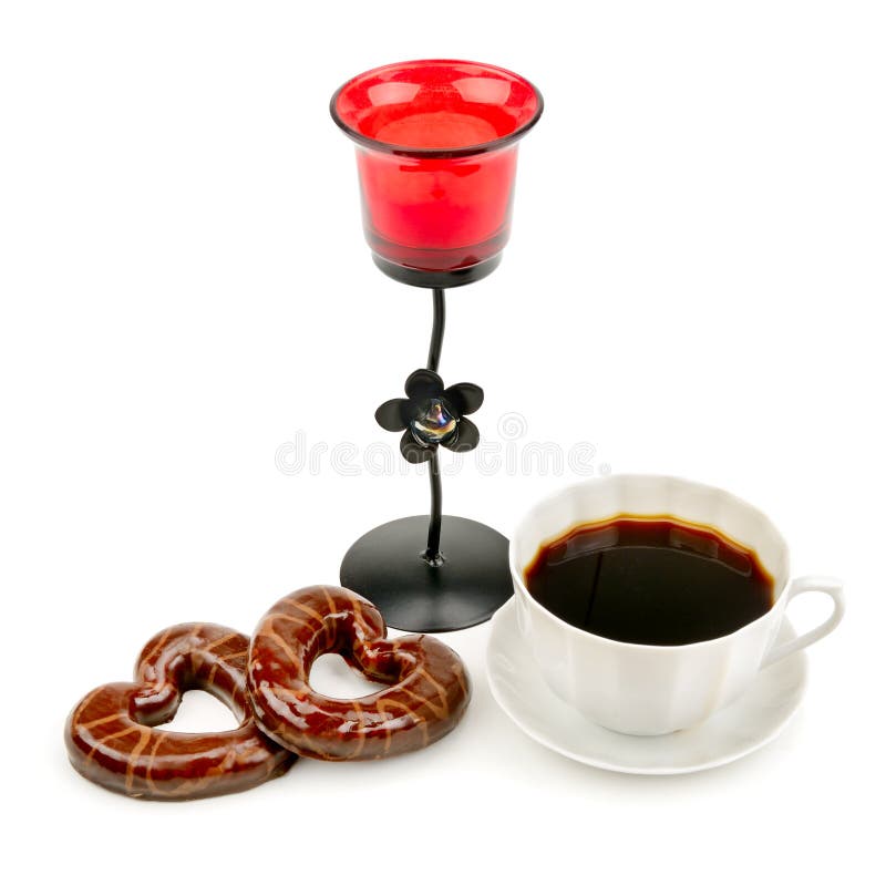 Tasse avec du café, des biscuits et un chandelier photographie stock libre de droits Tasse avec du café, des biscuits et un chandelier photographie stock libre de droits