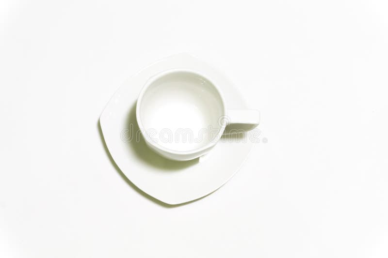 Tasse de café blanc sur le fond blanc image stock Tasse de café blanc sur le fond blanc image stock