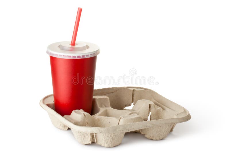 Tasse rouge de carton dans le support de tasse photo stock Tasse rouge de carton dans le support de tasse photo stock