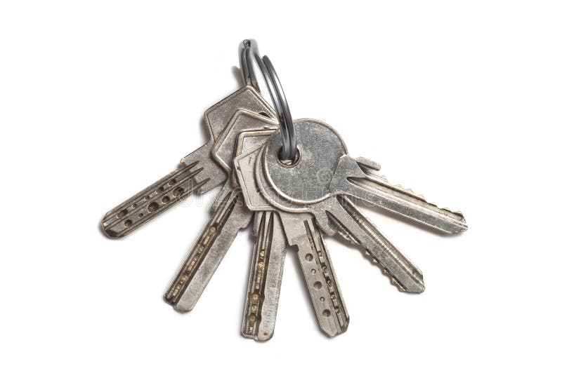 Photo of some keys and keyring isolated on white. Photo of some keys and keyring isolated on white.
