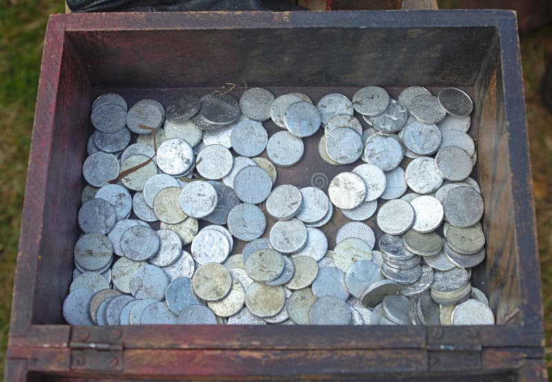 Wooden treasure chest with medieval coins. Wooden treasure chest with medieval coins...