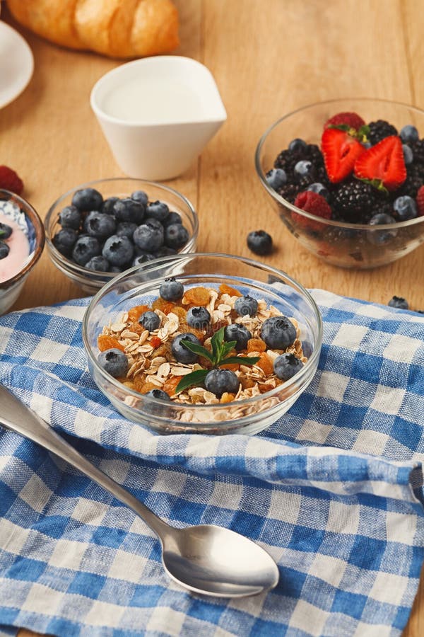 Rich breakfast on natural wooden table