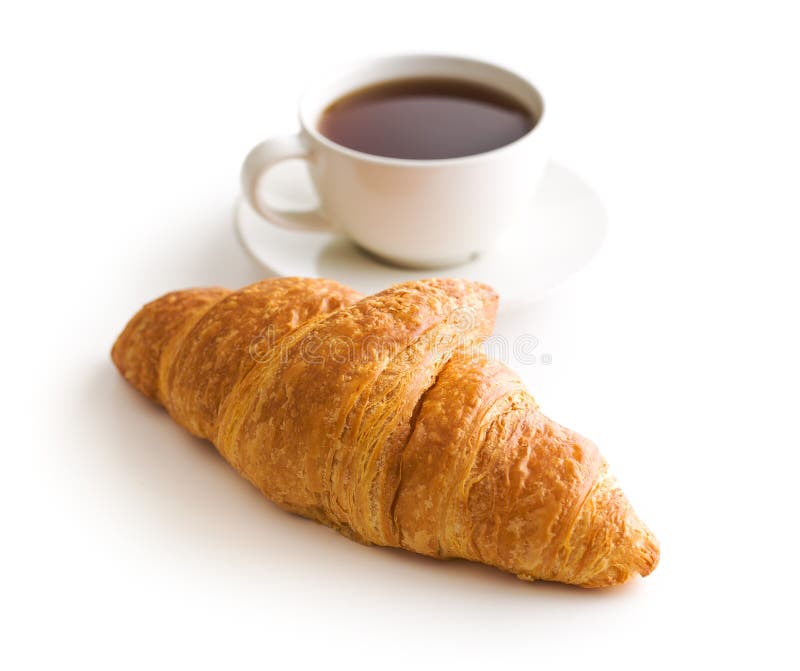 Tasty buttery croissant and cup of coffee.