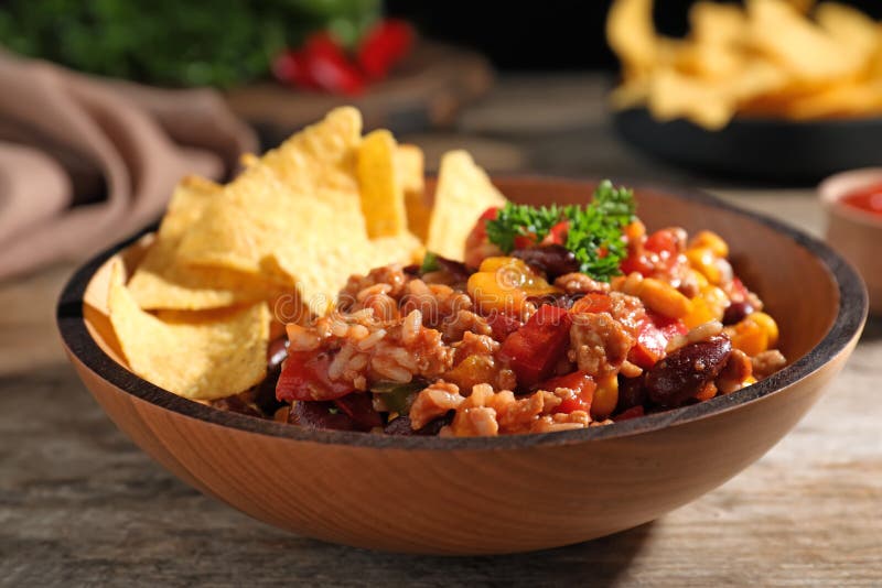 Tasty Chili Con Carne Served with Tortilla Chips in Bowl Stock Photo ...