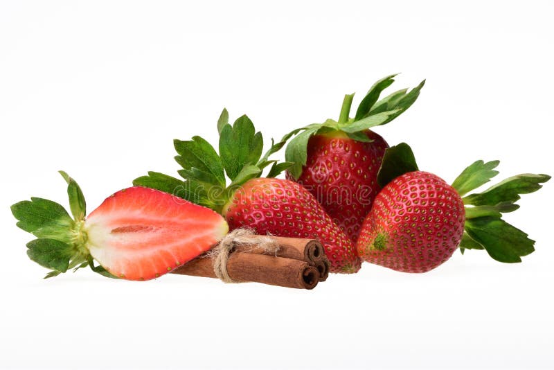Tasty composition of ripe red strawberry berries with green petals and cinnamon sticks royalty free stock photos Tasty composition of ripe red strawberry berries with green petals and cinnamon sticks royalty free stock photos