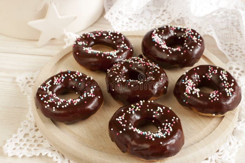 Tasty donuts with chocolate cream