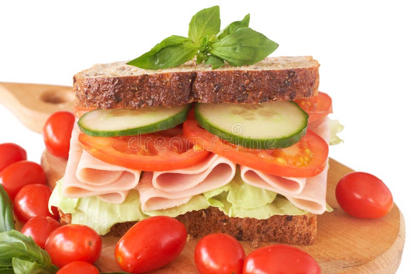 Tasty ham, tomato and cucumber sandwich