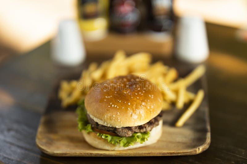 Hamburger with Fried Potatoes and Salad Stock Photo Image of dinner