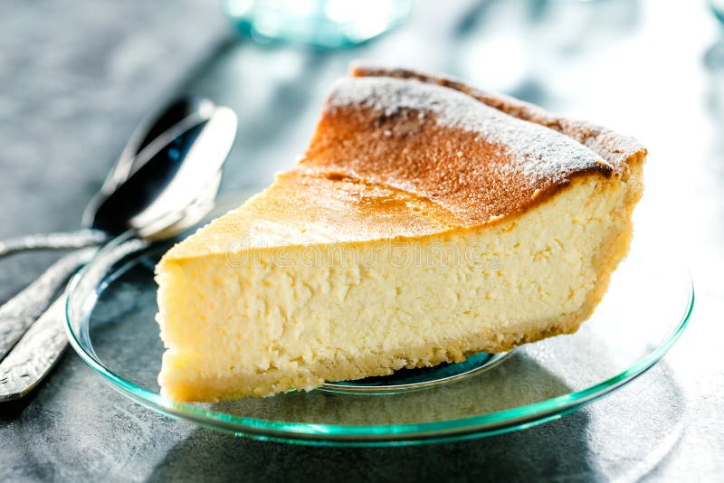 Tasty homemade cheesecake on blue wooden table. Selective focus. royalty free stock images Tasty homemade cheesecake on blue wooden table. Selective focus. royalty free stock images