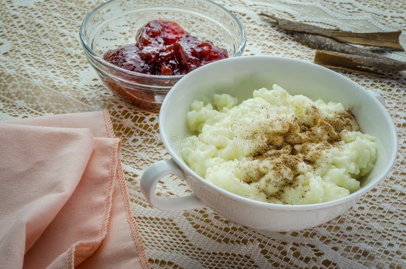 A Dish of Rice Pudding with Jam and Cinnamon. Stock Image Image of