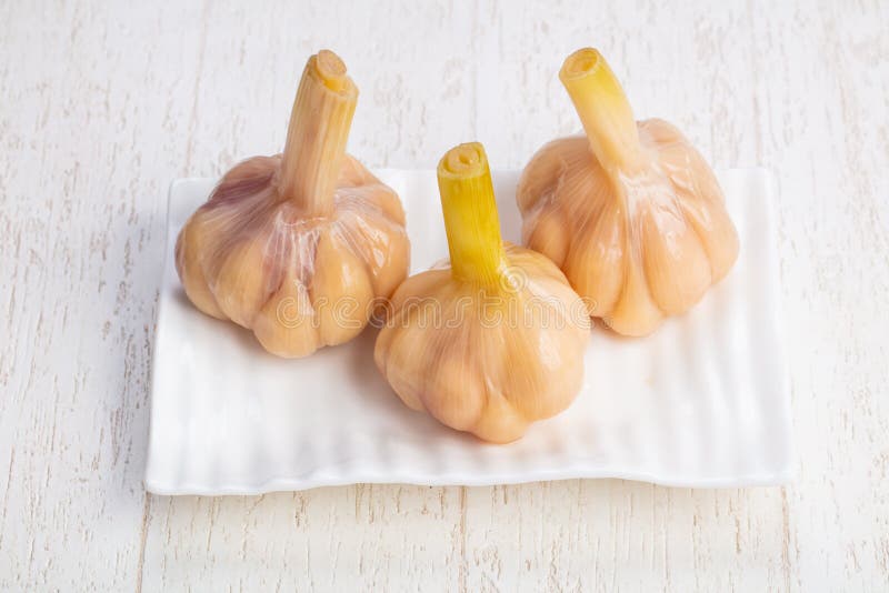 Tasty marinated garlic stock photo. Image of white, vegetables 129615504