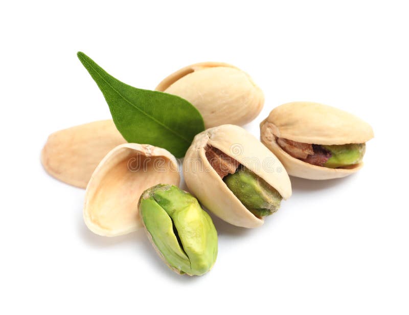 Tasty organic pistachio nuts and leaf on white background, closeup stock photography Tasty organic pistachio nuts and leaf on white background, closeup stock photography