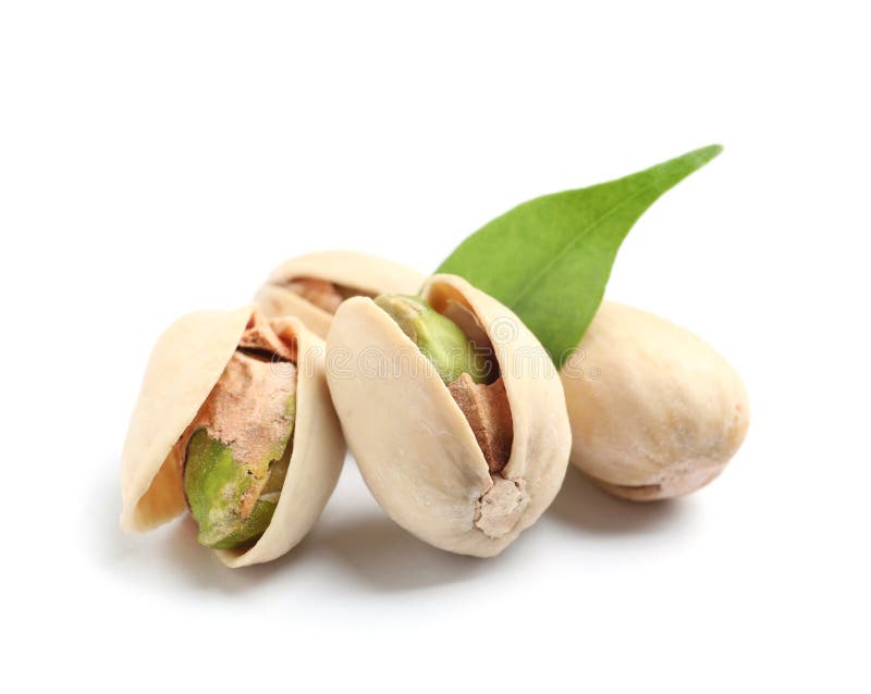 Tasty organic pistachio nuts with leaf on white background stock photography Tasty organic pistachio nuts with leaf on white background stock photography