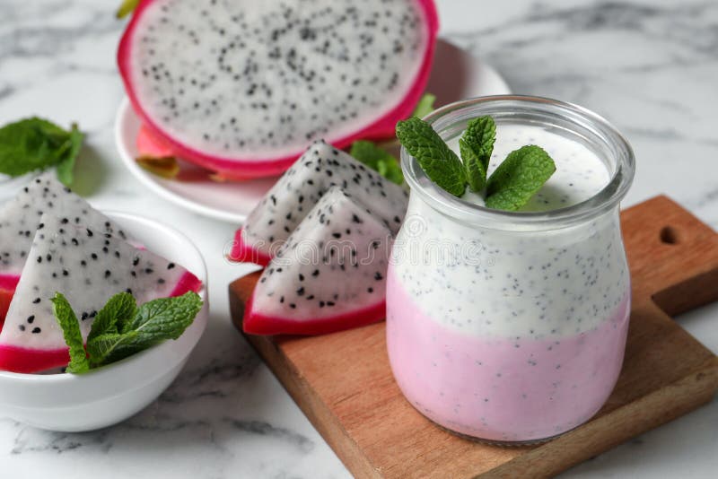 Tasty Pitahaya Smoothie, Dragon Fruits and Fresh Mint on White Marble ...