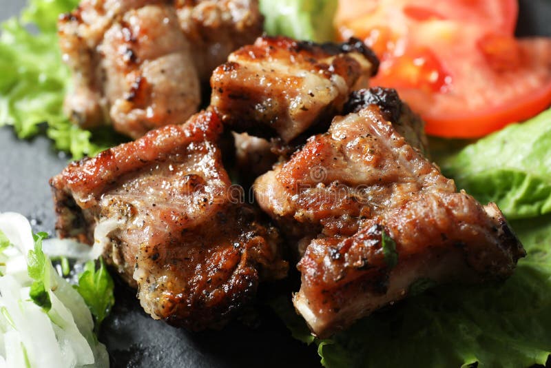 Tasty shish kebab served on slate plate royalty free stock image Tasty shish kebab served on slate plate royalty free stock image