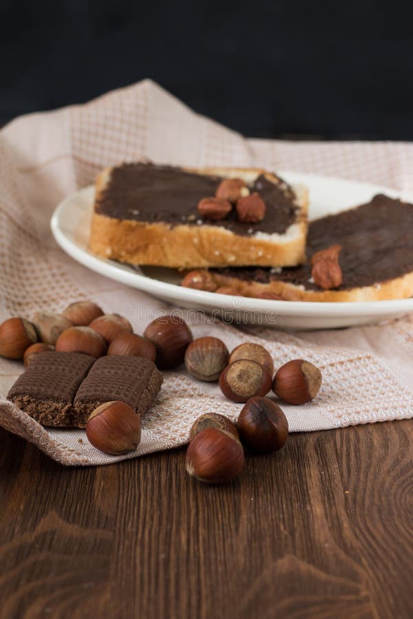 Tasty toast with peanut butter on a plate royalty free stock images Tasty toast with peanut butter on a plate royalty free stock images