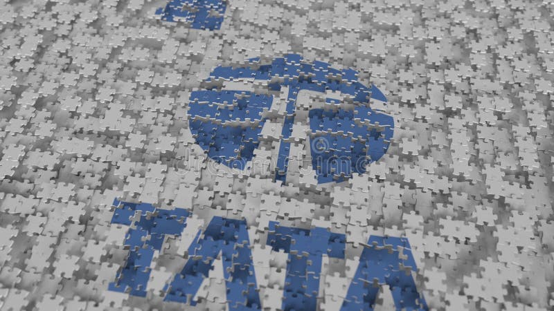 In this photo illustration, the Tata Steel logo is displayed on a