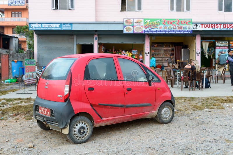 Tata Nano vermelha imagens de stock royalty free Tata Nano vermelha imagens de stock royalty free