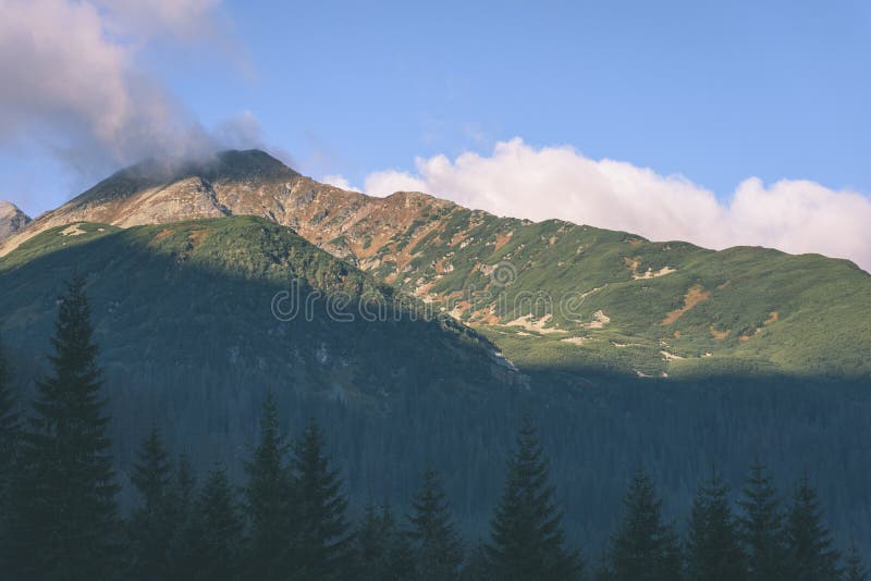 Tatra mountain peak view in Slovakia in sunny day - vintage retro film look