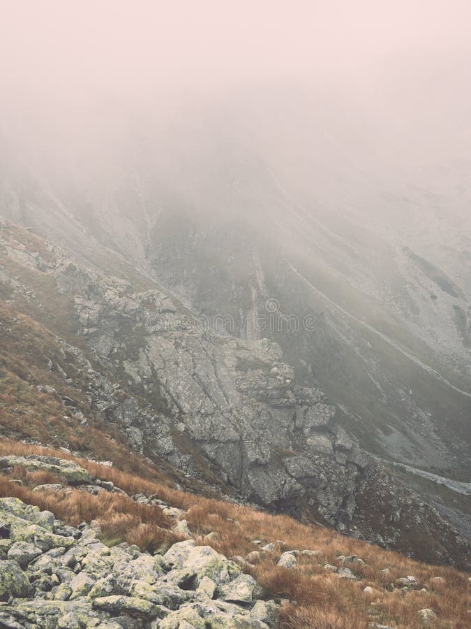 Tatra mountains in Slovakia covered with clouds - vintage effect