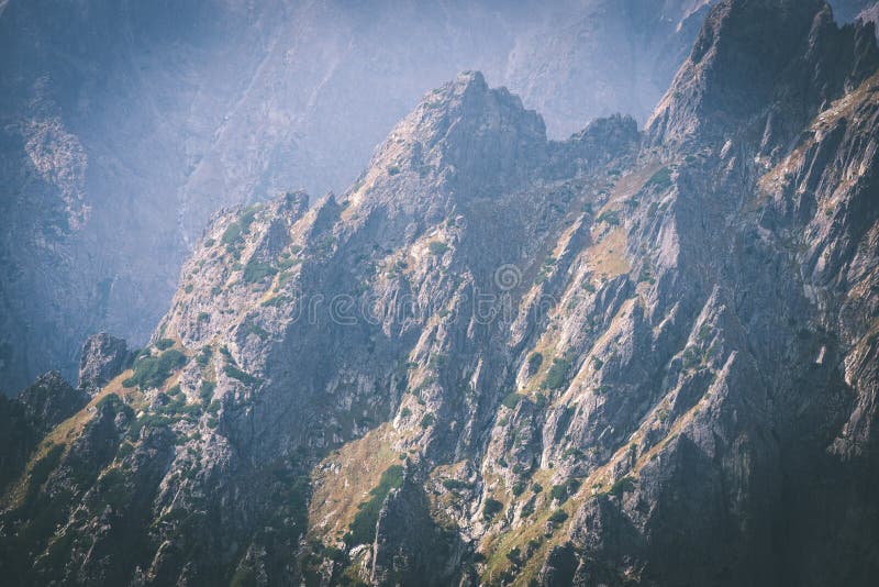 Tatra mountains in Slovakia covered with clouds - vintage film e