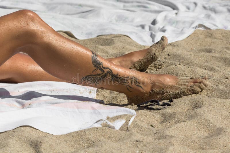 Beach Girl Nude Sunbathing - 1,617 Tattoo Woman Beach Photos - Free & Royalty-Free Stock Photos from  Dreamstime