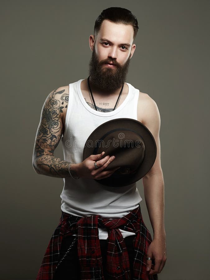 Download A Man With Tattoos Covering His Hands | Wallpapers.com