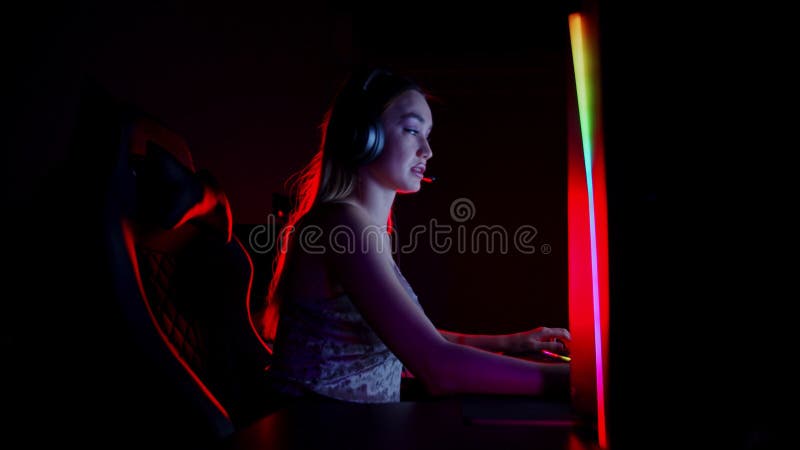 Sexy Young Woman Sitting in Gaming Club and Playing Online Game, People  Stock Footage ft. body & clothes - Envato Elements