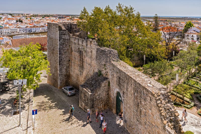 Walls of the partially ruined Castle in the picturesque and historic town of Tavira. Originally built during the Moorish rule in the 11th century the town was conquered by Christian Crusaders in 1242. The castle as can be seen today was further expanded and strengthened by King Dinis in 1294. Walls of the partially ruined Castle in the picturesque and historic town of Tavira. Originally built during the Moorish rule in the 11th century the town was conquered by Christian Crusaders in 1242. The castle as can be seen today was further expanded and strengthened by King Dinis in 1294.