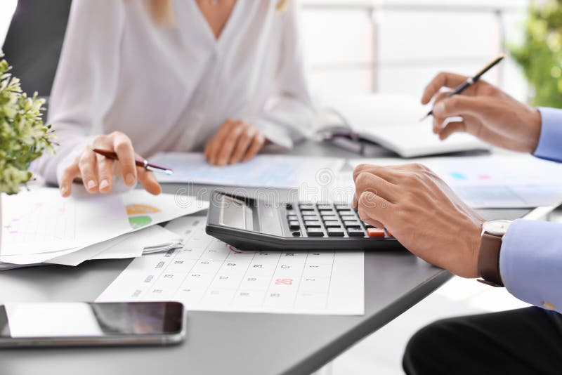 Tax Accountants Working with Documents Stock Photo Image of closeup