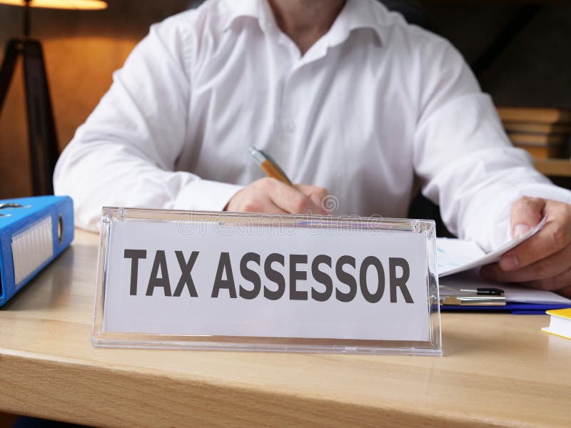 Tax Deduction is Shown Using the Text Stock Image Image of office