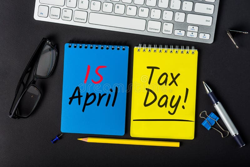 Tax time -15th April 15 - Tax day in USA. Notification of the need to file tax returns, tax form at accauntant workplace stock photo