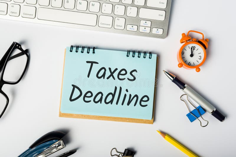 Taxes deadline - Tax time - Notification of the need to file tax return forms, April 15th - tax day 2020 royalty free stock photo