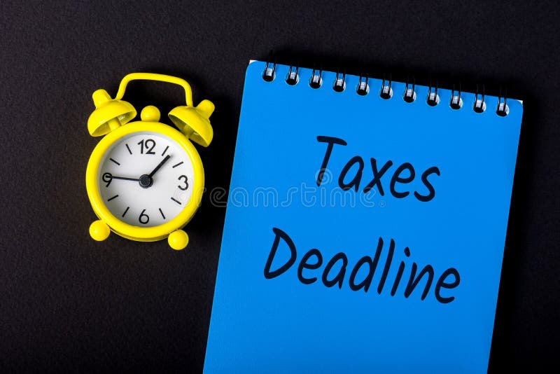 Taxes deadline or tax time - Notification of the need to file tax returns, tax form at accauntant workplace stock images