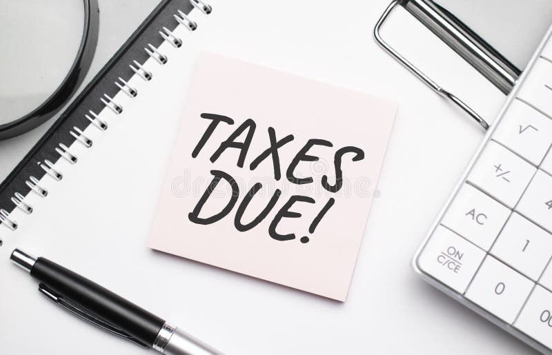 TAXES DUE. Notepad, Eyeglasses and White Pen Stock Photo Image of