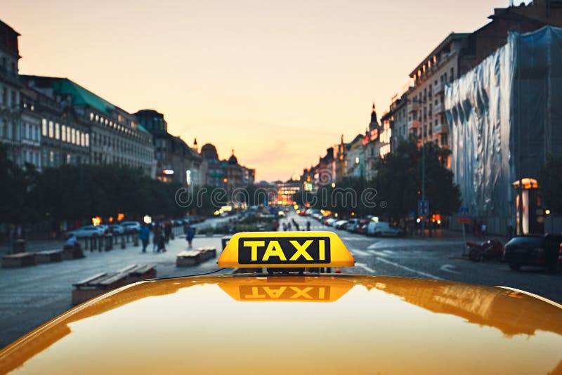 Taxi car on the city street stock photos Taxi car on the city street stock photos